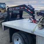 PJ Trailer and Flatbed Truck with Shocker Gooseneck Air Hitch (Round Stem - Angled Pin Holes)