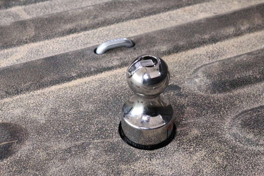 Flip release hitch ball