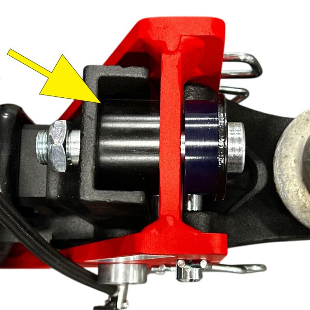 Close-up of the truck-side bump cushion lightly compressed by the air receiver hitch frame