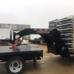 Gooseneck Surge on Flatbed Truck w/ Flatbed Trailer